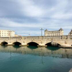Ponte Umbertino (19th century); historic stone-arched bridge named for King Umberto I.