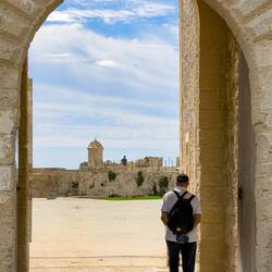 Guard tower in the central courtyard ... from the arched entrance at the end of the moat bridge.