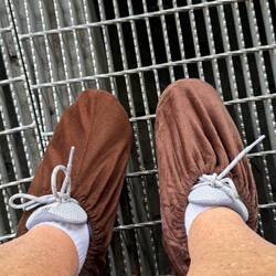 Booties for the glass walkway