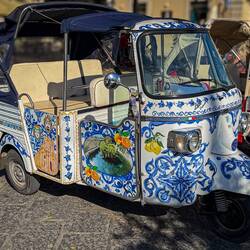 Decorated Piaggio Ape car near the Mercato di Ortigia, Siracusa.
