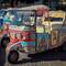 Decorated Piaggio Ape cars waiting for customers ... near the Ortigia Market.