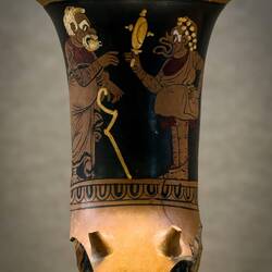 Vase depicting a comedy scene with a servant holding a mirror for his master; end of 2nd century BCE