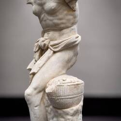 Old fisherman with a basket of fish; Roman copy of a Hellenistic original; circa 220-200 BCE.