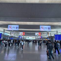 Bullet train station - every "gate" is a separate train and they go as far as the eye can see