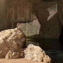 Shimmering reflections of the water on the walls of the Ropemakers' Cave.