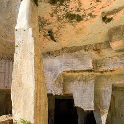 This pillar was restored when it began to crumble — Ropemakers' Cave.