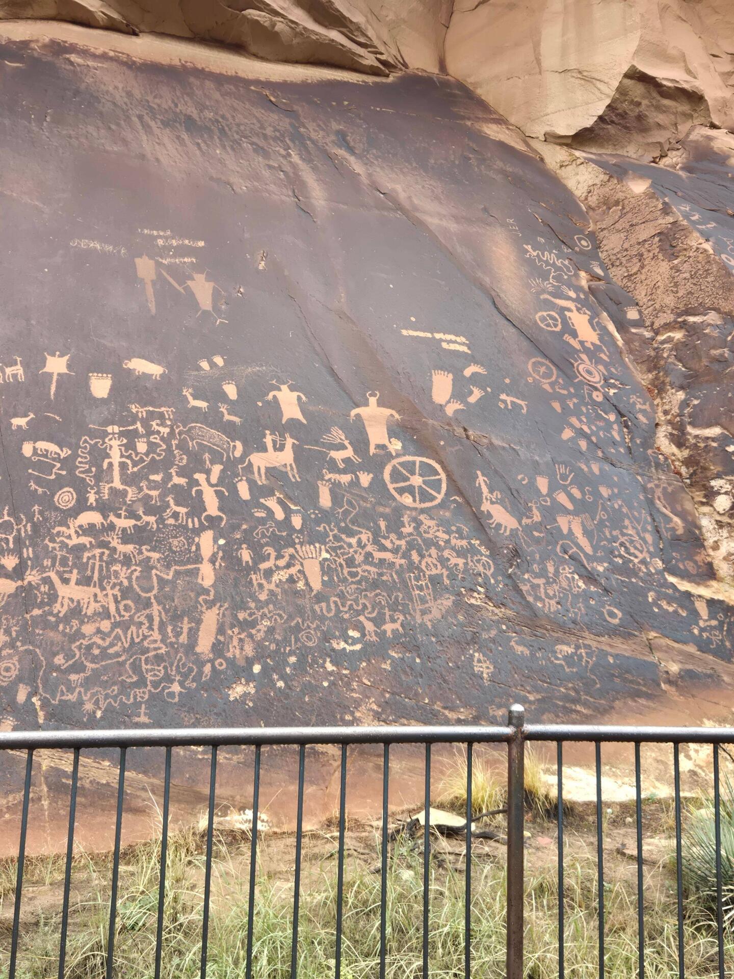 Newspaper rock has petroglyphs from at least 3 different tribes over a long history.