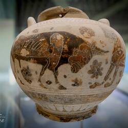 Middle Corinthian pottery from tomb 41 (400-370 BCE) with frieze of sphinxes and animals.