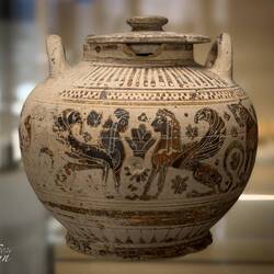 Middle Corinthian pottery from tomb 41 (400-370 BCE) with frieze of sphinxes and animals.