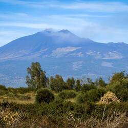 Etna is smoking today ... from the train to Palermo as we leave Catania.