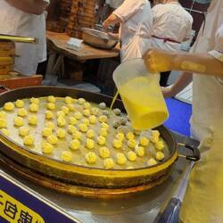 VERY curious about this dish - laid out the dumplings just so and then poured a batter over them