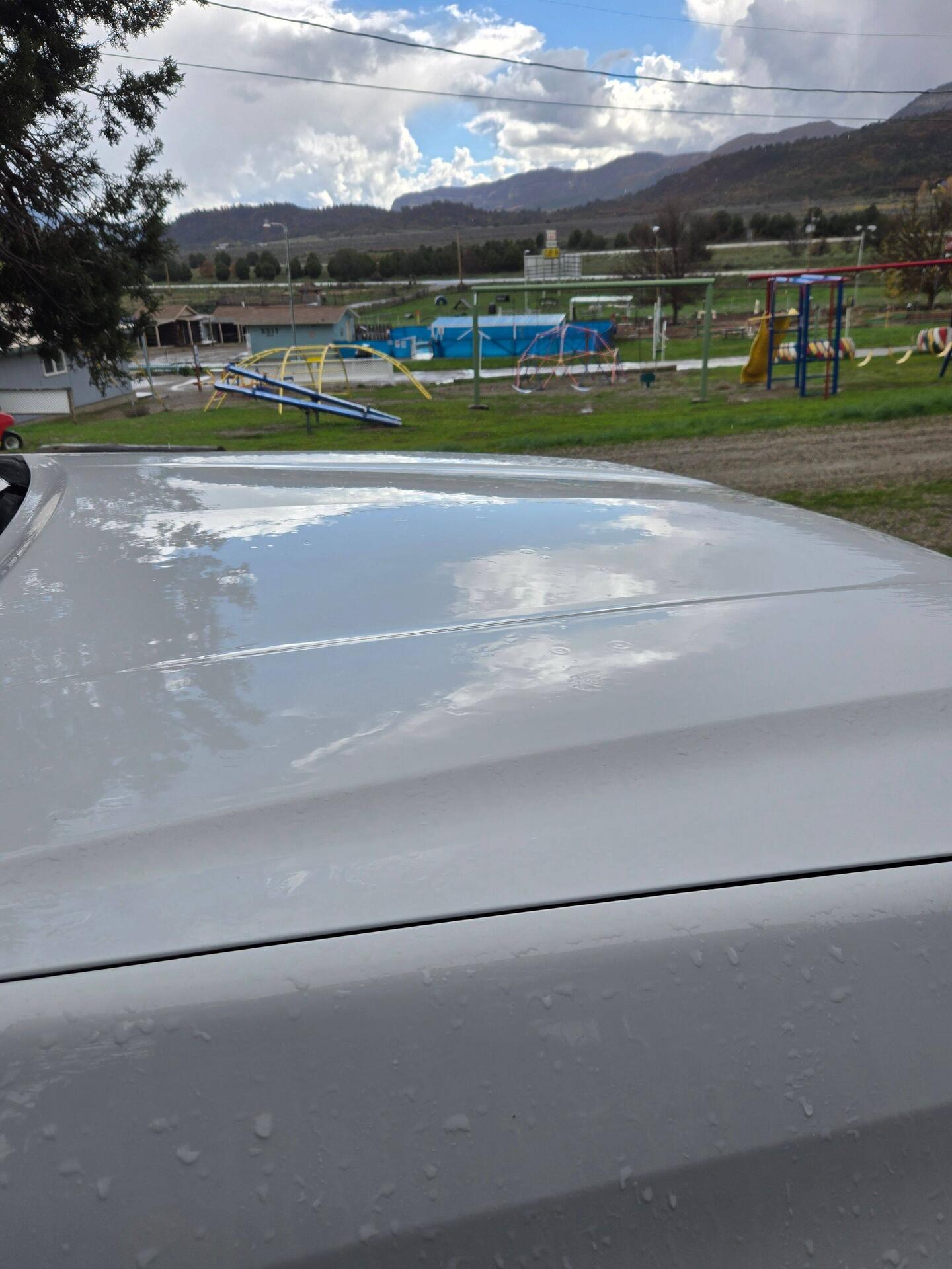 Trying to show the rain and sleet mix on the car hood.