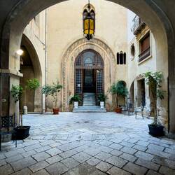 Entrance to the Palazzo Alliata di Villafranca from the courtyard.